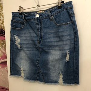 Ripped denim mini skirt